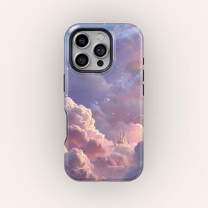 May include: A phone case featuring a dreamy cloudscape with a castle silhouette. The case has a glossy finish and a protective bumper. The design showcases a pastel color palette of pink, purple, and blue, with stars scattered throughout.
