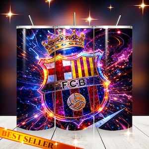 May include: A stainless steel tumbler featuring the FC Barcelona crest, a crown, and the letters "FCB" against a vibrant, cosmic background. The design includes a soccer ball and a Nike swoosh. The tumbler has a straw and the words "BEST SELLER".