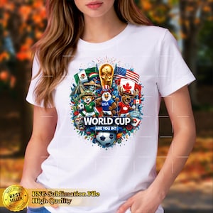May include: White t-shirt featuring a colorful graphic with the text "WORLD CUP ARE YOU IN?". The design includes cartoon animals, flags, a soccer ball, and a golden trophy. The shirt also has the text "PNG Sublimation File High Quality".