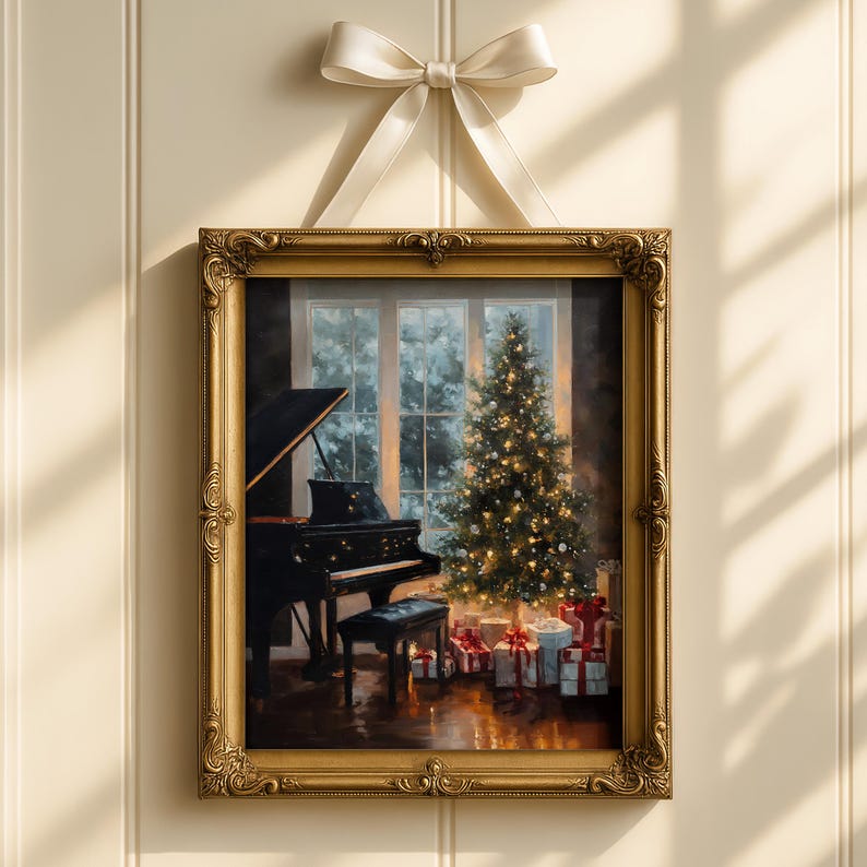May include: A framed painting of a Christmas scene. The painting depicts a black grand piano, a decorated Christmas tree, and wrapped gifts. The frame is gold, and the painting is suspended by a cream-colored ribbon.