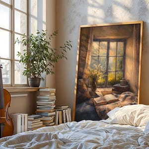 May include: A cello leans against a window with a view of a city. A framed painting depicts a window scene with an open book and flowers. A stack of books and a potted plant sit on the windowsill. A bed with white linens is in the foreground.