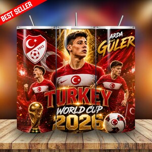 May include: A set of three stainless steel tumblers featuring a soccer theme. Each tumbler showcases a Turkish flag, a soccer player, and the text "Turkey World Cup 2026." One tumbler has the text "Arda Güler." The tumblers have a red and white color scheme.