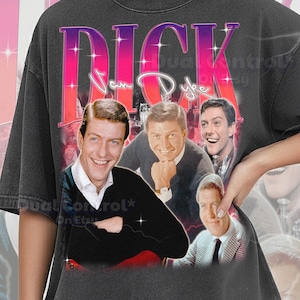 May include: Dark gray Comfort Color Pepper t-shirt featuring a graphic of Dick Van Dyke with his signature and the name "Dick" in a pink and purple gradient. The shirt has a vintage aesthetic.