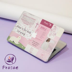 May include: A pink and white laptop skin featuring religious imagery and text. The design includes a lamb, cross, and the words "Jesus is the best company." Additional text includes Bible verses and the word "Peace."