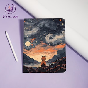 May include: A notebook with a fox illustration gazing at a starry night sky. The cover art features a fox silhouette, a full moon, and a landscape with dark blue, orange, and black hues. A white stylus and the brand name "Prasae" are also visible.