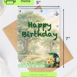 May include: A rectangular greeting card measuring 5 inches by 7 inches featuring a watercolor forest scene with trees, butterflies, and a small fairy holding a green umbrella. The text Happy Birthday is printed in large, dark green, textured letters.