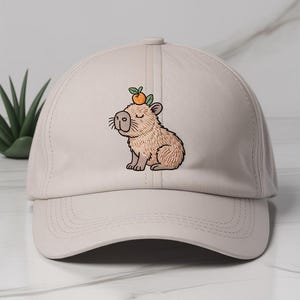 Capybara Orange Embroidered Hat-Capybara On The Head – Super Chill Embroidered Hats For Adorable Souls