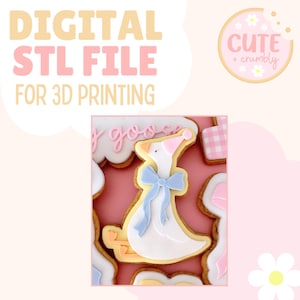 May include: A digital STL file for 3D printing, showcasing a goose-shaped biscuit with a blue bow and a pink party hat. The image includes other decorated biscuits and the text "Cute + Crumby".