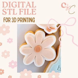 May include: A close-up of a flower-shaped cookie with a light pink center and petals, outlined in white and a golden-brown edge. The text "DIGITAL STL FILE FOR 3D PRINTING" is at the top. The background is a light beige with flower graphics.