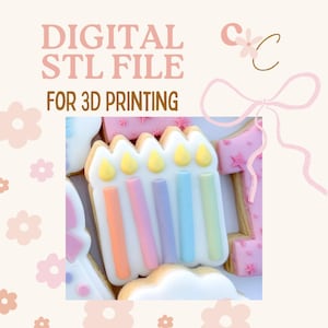 May include: A digital STL file for 3D printing featuring a cookie shaped like five birthday candles with pastel orange, pink, purple, blue, and green icing, topped with yellow flames, alongside a pink cookie shaped like the number one.