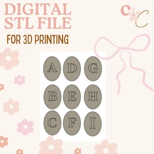 May include: Digital STL file for 3D printing. Nine grey oval shapes, each with a letter from A to I. The background is a light peach colour with pink floral and bow accents.