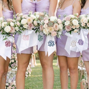 May include: A set of three ceramic mugs with a speckled, matte finish. The mugs are in shades of cream, light gray, and dark gray. Each mug has a simple, minimalist design, perfect for coffee or tea.