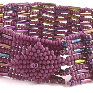May include: A purple beaded bracelet with a woven design featuring iridescent glass beads and gold-toned beads.