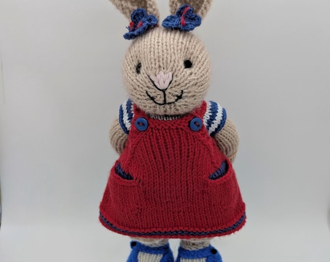 Beige Girl Bunny in Blue and White striped Top with Red Pinafore.