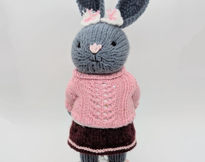 Bunny girl in marron skirt and pink jumper
