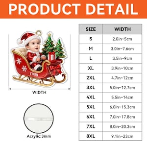May include: A Christmas ornament featuring a baby in a Santa suit sitting in a red sleigh with green trees and a gift. The sleigh is labeled with the name ETHAN. A size chart lists widths from 2.0 inches to 9.1 inches, and the acrylic material is 3mm thick.