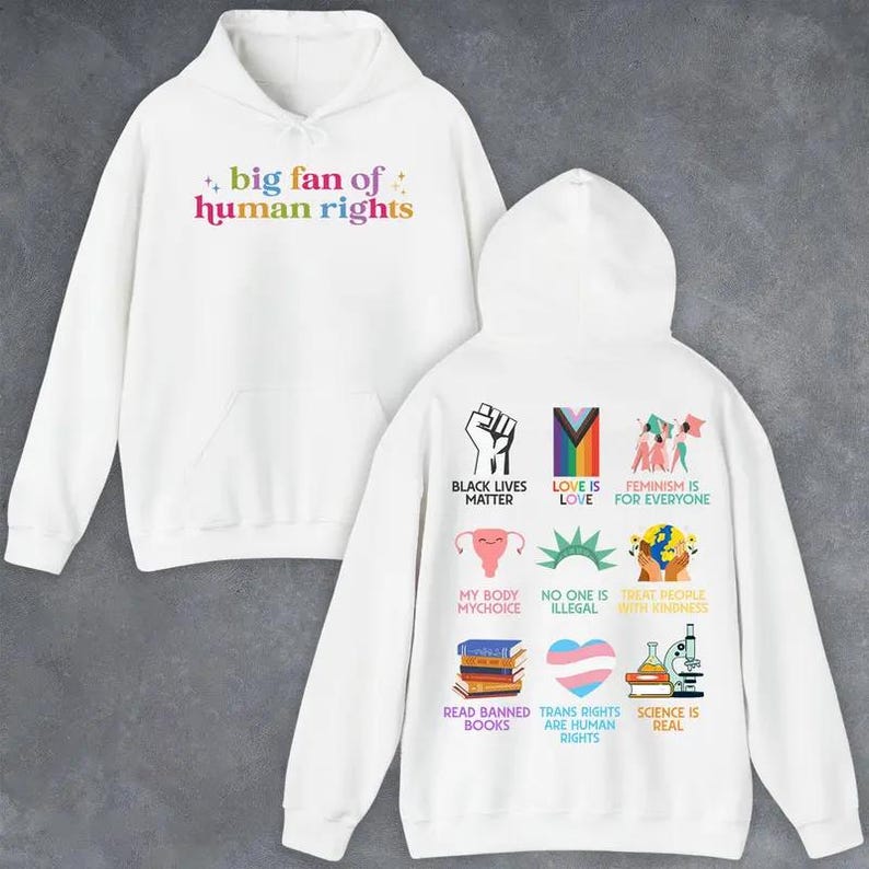 May include: White hoodie with the text "big fan of human rights" in rainbow colors on the front. The back features various graphics and phrases, including "Black Lives Matter," "Love is Love," and "Science is Real."