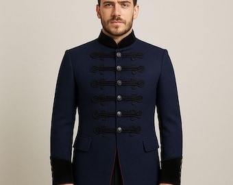 May include: A navy blue military-style jacket with a high collar and black trim. The jacket features decorative black rope detailing and silver buttons down the front. The cuffs are black velvet. A classic, tailored garment.