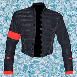 Michael Jackson black military jacket inspired by MTV Awards, featuring gold embellishments on black wool fabric.