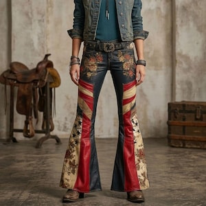 May include: Bell-bottom pants featuring a dark blue base with red and cream vertical panels. The pants are decorated with floral patterns near the waist and hem, and black star motifs on the lower legs. A dark belt with a metal buckle is worn.