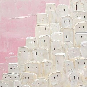 May include: A painting of a white village with a pink sky. The village is made up of many small, white buildings with windows and doors. The sky is a soft pink color, and there are clouds in the distance.
