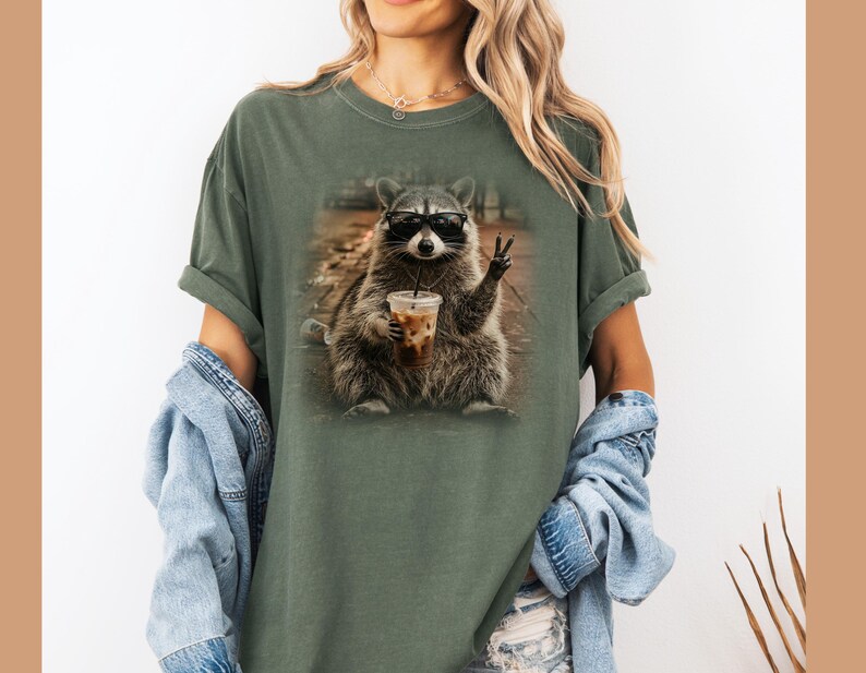 Funny animal raccoon holding iced coffee stylish shirt design
