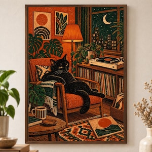 May include: A framed wall art print depicting a black cat lounging in an orange armchair within a cozy room. The scene includes a record player, a floor lamp, potted plants, a patterned rug, and a window showing a night cityscape.