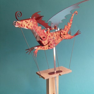 Large painted aluminum dragon automata