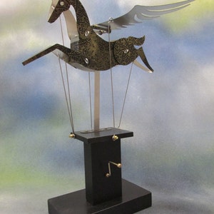 Black and gold Pegasus automata with black base image 4