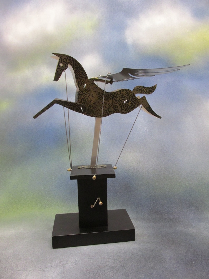 Black and gold Pegasus automata with black base image 1