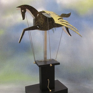 Black and gold Pegasus automata with black base image 2