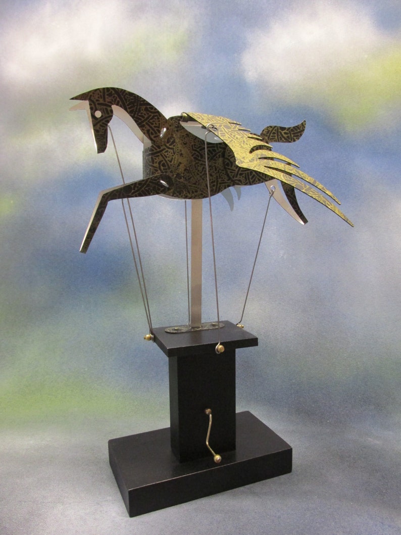 Black and gold Pegasus automata with black base image 2