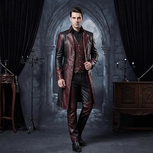 May include: A long coat, vest, and trousers ensemble featuring a color-blocked design in black and deep red. The coat has a structured collar and button closures, while the vest and trousers maintain a matching two-tone leather-like appearance.