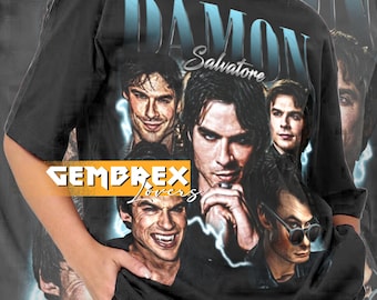 May include: Black unisex t-shirt featuring a graphic of Damon Salvatore with the text "DAMON Salvatore". The shirt has a vintage style design with multiple images of the character. The text "GEMBREX Lovers" is also visible.