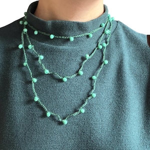 Boho Chic Crochet Necklace in Green Yarn and Blue Green Beads. Hand-crocheted long multi-way necklace.