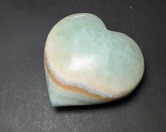 Green pistachio calcite polished heart shape stone, from Pakistan- 105 grams