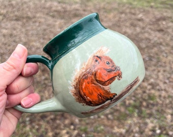 Limited Edition Red Squirrel Mug, Acorn, Hand-Painted, Art Mug, Green, Coffee Mug, Teacup, Art, Handmade Pottery by Daisy Friesen