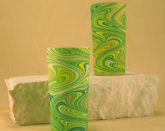 Tall Votive Candle holders in swirls of Green and Yellow.