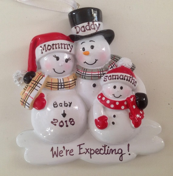 family ornaments with pregnant mom