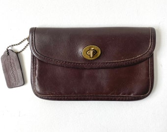 coach gallery pouch with umbrella motif