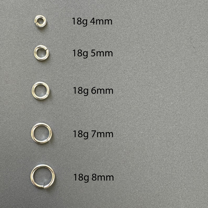 May include: Five silver jump rings in different sizes, labeled 18g 4mm, 18g 5mm, 18g 6mm, 18g 7mm, and 18g 8mm.