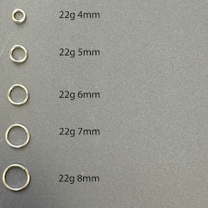 May include: Five silver hoop earrings of different sizes, labeled with their gauge and diameter: 22g 4mm, 22g 5mm, 22g 6mm, 22g 7mm, and 22g 8mm.