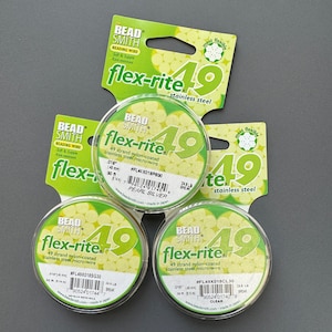 May include: Three spools of Bead Smith Flex-Rite 49 strand nylon-coated stainless steel micro-wire beading wire. The spools are labeled with the color: Pearl Silver, Metallic Gold, and Clear. Each spool is 30 ft (9.14 m) long and has a 24.8 lb break strength.