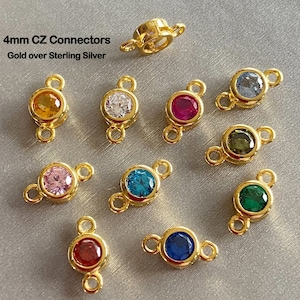 Puede incluir: Surtido de conectores de plata de ley chapados en oro de 4 mm con piedras de circonita cúbica transparentes y de colores. Los conectores tienen dos bucles para sujetar a las joyas.