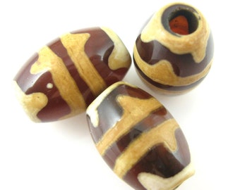 Carnelian dZi bead - Olive Shape with Twin Tiger's Teeth  - Glossy Carnelian Stones- 12x8mm - Tibetan Stone Beads - Sku: 302113