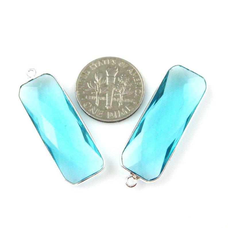 Long Bar Gem Pendant Sterling Silver Frame Blue Topaz Gemstone Pendant SKU: 201114-BTO Faceted Elongated Rectangle 34mm 1pc