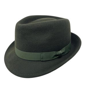 May include: A dark green fedora hat with a wide brim and a matching ribbon tied in a bow at the front.