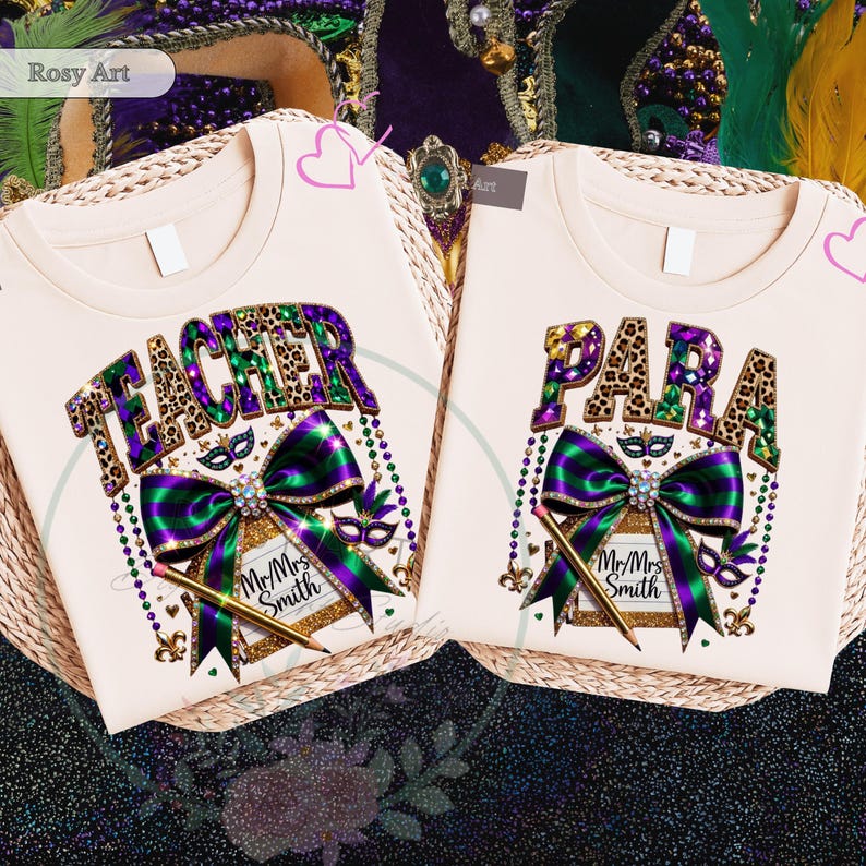 May include: Two cream-colored t-shirts with the words "TEACHER" and "PARA" in leopard print and purple letters. Each shirt features a large green and purple bow, a pencil, and a decorative mask. The shirts are on a woven surface.