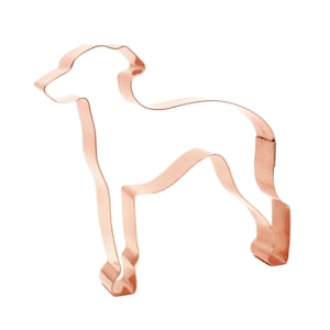 May include: A copper-colored metal cookie cutter in the shape of a standing Italian Greyhound dog.