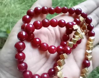Retro-style ruby root necklace